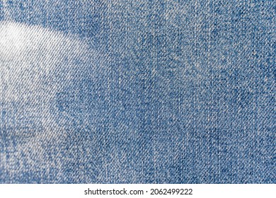 Worn Blue Denim Canvas Texture For Use As A Background - Cotton Textile Close-up