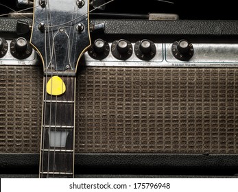 worn electric guitar and amplifier, for music and entertainment themes