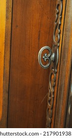 Worn Knobs Of An Armoire