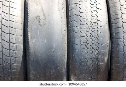 Worn Out Bald Old Car Tire Close-up