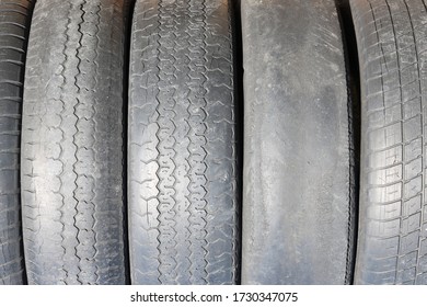 Worn Out Bald Old Car Tire Close-up