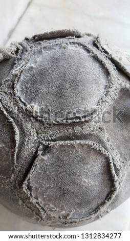 worn out soccer ball