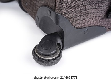 Worn Out Wheel On A Rolling Luggage Trunk