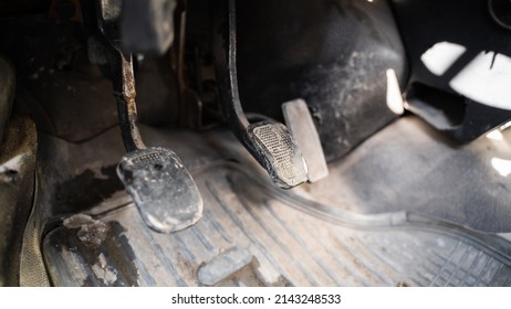 Worn Pedals Of A Truck Working Car Close-up. Brake Pedal