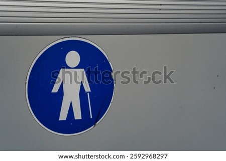 Worn priority seating sign for elderly passengers