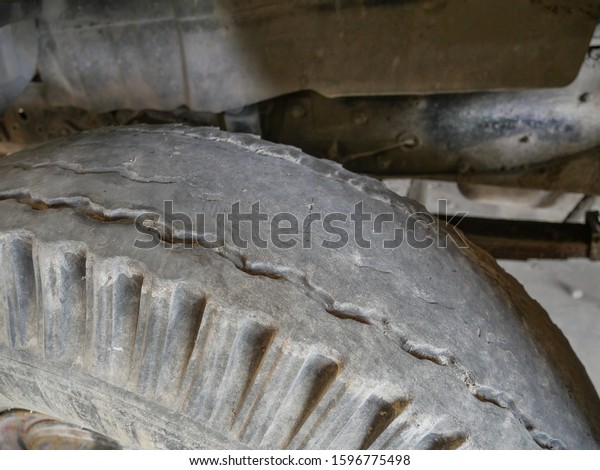 Worn rubber tire,\
old vehicle rubber tire