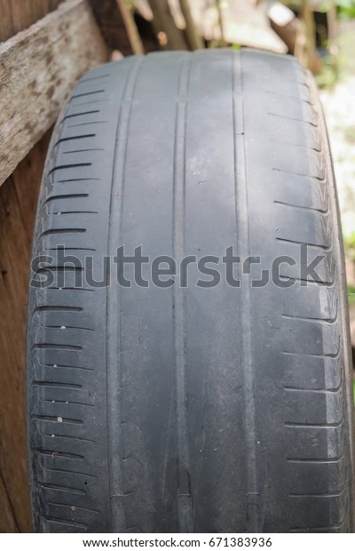 Worn rubber tire,\
old vehicle rubber tire 