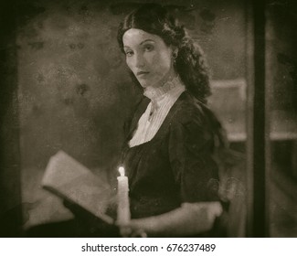 Worn Wet Plate Photo Of Victorian Girl Reading Book By Candlelight Behind Window.