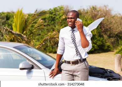 Worried African American Man With Broken Car Calling For Help