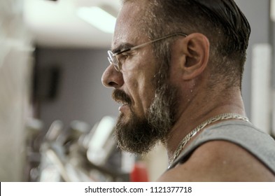 Worried Bearded Thoughtful Man Face.Middle Aged Man Profile With Eye Glasses And Beard,focused On Work Problem.Sweat On Close Up Face Portrait.