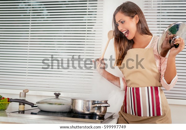 images of worried woman at kitchen table