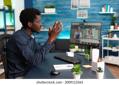 Worried Black Family Man About Child In Hospital Ward Talking With Doctor On Video Conference Call Using Webcam For Online Connection. Telemedicine Patient Learning About Disease