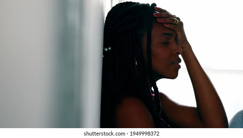 Worried black woman feeling anguish. anxious African female