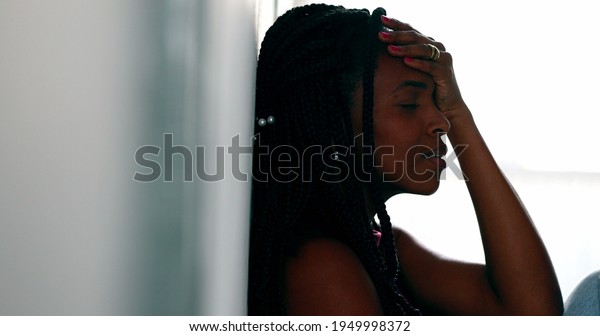 Worried black woman feeling anguish. anxious\
African female