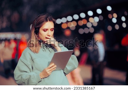
Worried Event Manager Using Pc Tablet Checking Schedule. Stressed party planner having difficulties organizing public festivity
