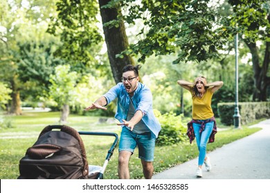 Worried father and mother running after their baby in stroller.