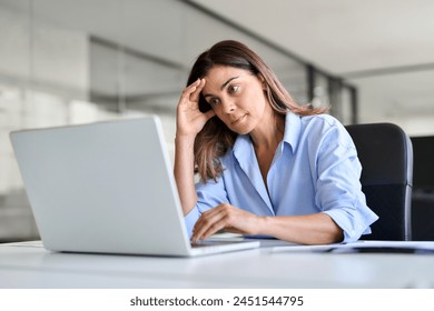 Worried fatigued mature business woman having headache at work. Tired upset busy 40s middle aged businesswoman feeling stress having problem at workplace looking at laptop computer in office. - Powered by Shutterstock