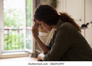 Worried Frustrated Young Woman Feeling Depressed And Lonely, Suffering From Stress And Nervous Breakdown After Emotional Trauma, Needing Psychological Help. Depression, Mental Healthcare Concept