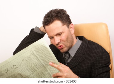 Worried Handsome Business Man Reading Newspaper - Portrait