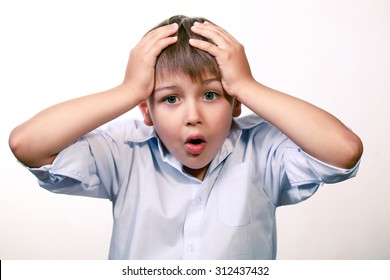 Worried Kid Grabbed His Head With His Hands