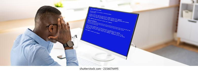 worried-man-computer-system-failure-screen-stock-photo-2156076495