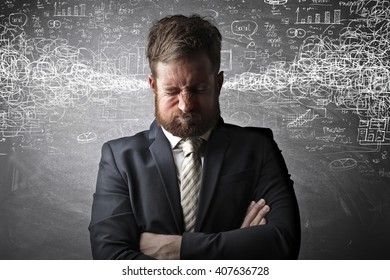 Worried manager full of work - Shutterstock ID 407636728
