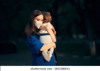 Worried Mother Wearing Face Mask Holding Her Child. Mom Feeling Anxious For The Future During Pandemic Health Crisis
