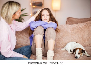 Worried Parent Mom Comforting Depressed Crying Teen Daughter Bonding At Home. Loving Understanding Mother Apologizing Or Supporting Sad Teenage Girl Having Psychological Puberty Problem Concept