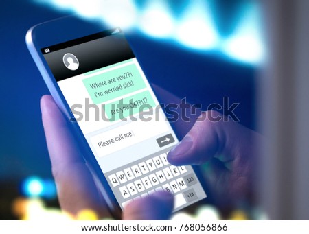 Worried parent writing text message to child that doesn't come home or answer or man typing sms to lost friend. Hand holding mobile phone late at night. Person or kid missing.