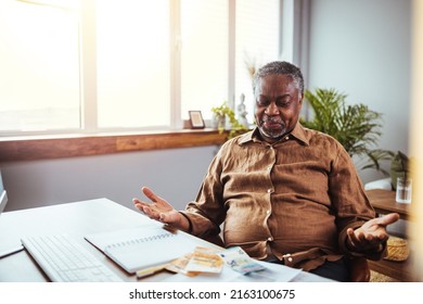 Worried Senior Man Reading Bad News In Paper Letter Document Feels Disappointed, Stressed Old Man Troubled With High Taxes Or Domestic Bills, Concerned About Bank Debt, Financial Problem Concept