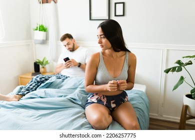 Worried Stressed Woman In Pajamas Looking Upset Finding An Engagement Ring Of His Partner While Getting Ready For Bed 