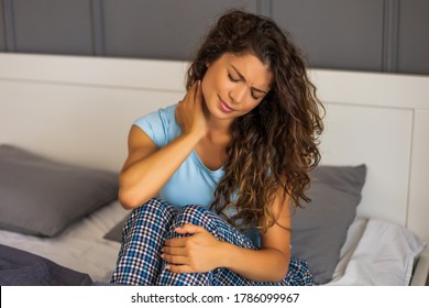 Worried Woman Is Having Pain In Her Neck.