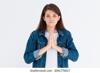 Worried Woman Need Something, Begging For Help And Say Please. Girl Apologizing, Making Clingy Sad Face And Pleading You, Standing Against White Background