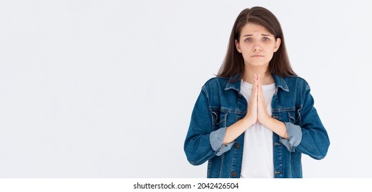 Worried Woman Need Something, Begging For Help And Say Please. Girl Apologizing, Making Clingy Sad Face And Pleading You, Standing Against White Background