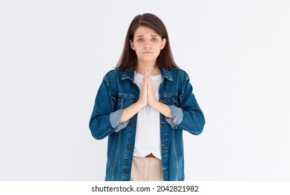 Worried Woman Need Something, Begging For Help And Say Please. Girl Apologizing, Making Clingy Sad Face And Pleading You, Standing Against White Background