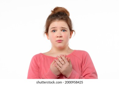 Worried Young Girl Standing White Background With A Frightened Expression On Her Face. Human Emotions, Facial Expression Concept