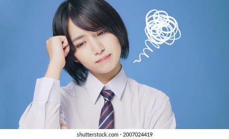 Worrying Asian Female High School Student. University Exam. Examinee.