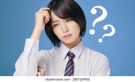 Worrying Asian Female High School Student. University Exam. Examinee.