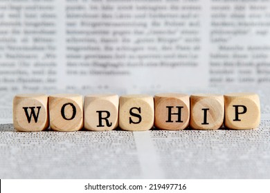 worship word on wooden block