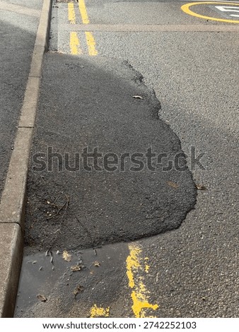 The worst example of a pot hole the council has mended. See it to believe it, asphalt tarmac road repair