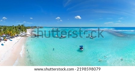 Worthing Beach on the south coast of the Caribbean island of Barbados in the West Indies. Beach with palm trees on ocean. Paradise beach. Hotel The Sands