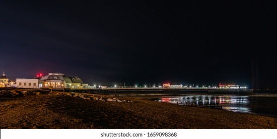 Worthing pier night time lights West Sussex England