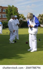 Worthing, West Sussex UK Circa 2010 Male And Female Lawn Bowls Teams Play On A Sunny Summers Afternoon In June