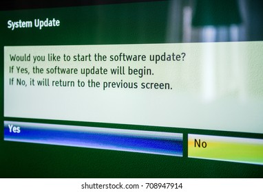 Would You Like To Start The Software Update? Choosing Yes Or No On Modern TV Screen