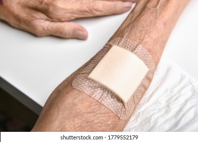 Wound Bandage, Dressing Arm Wound With Sterile Plaster Pad, Accidental Wound Care Treatment In Elder Old Man.