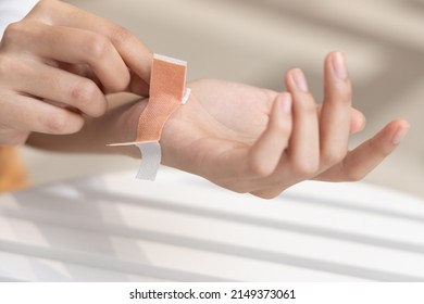 Wounded Hand Of Woman, First Aid Treated With Elastic Bandage, Closeup Shot