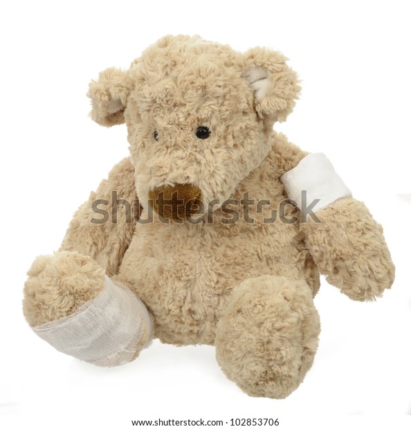 teddy bear with bandage on head