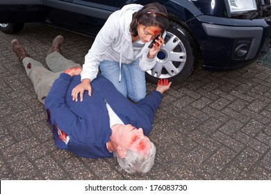 Wounded Woman Calling For An Ambulance After A Car Accident