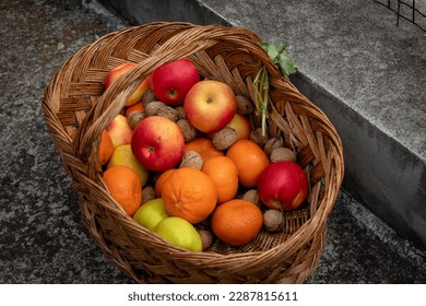 A Woven basket full of different fruit. - Powered by Shutterstock