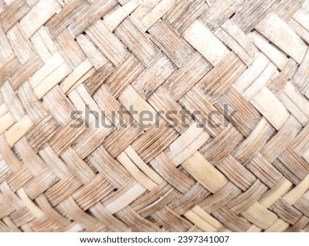 woven texture background of bamboo trees. up close the texture of traditional handicrafts or woven art, looks beautiful with patterns, stripes and criss-crosses. nice background. natural concept.